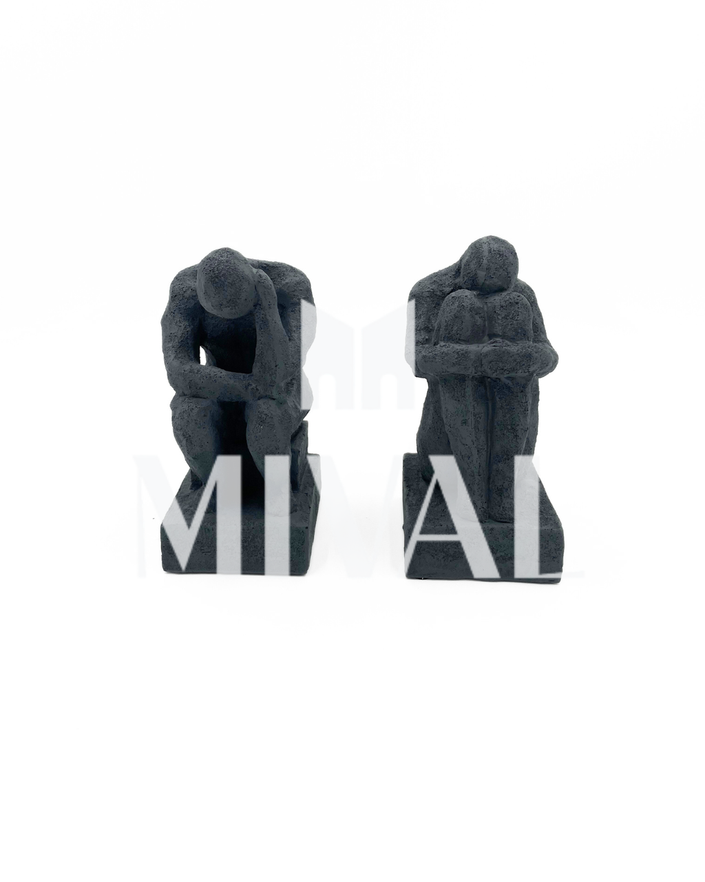 ESCULTURA PERSONAS AGACHADAS