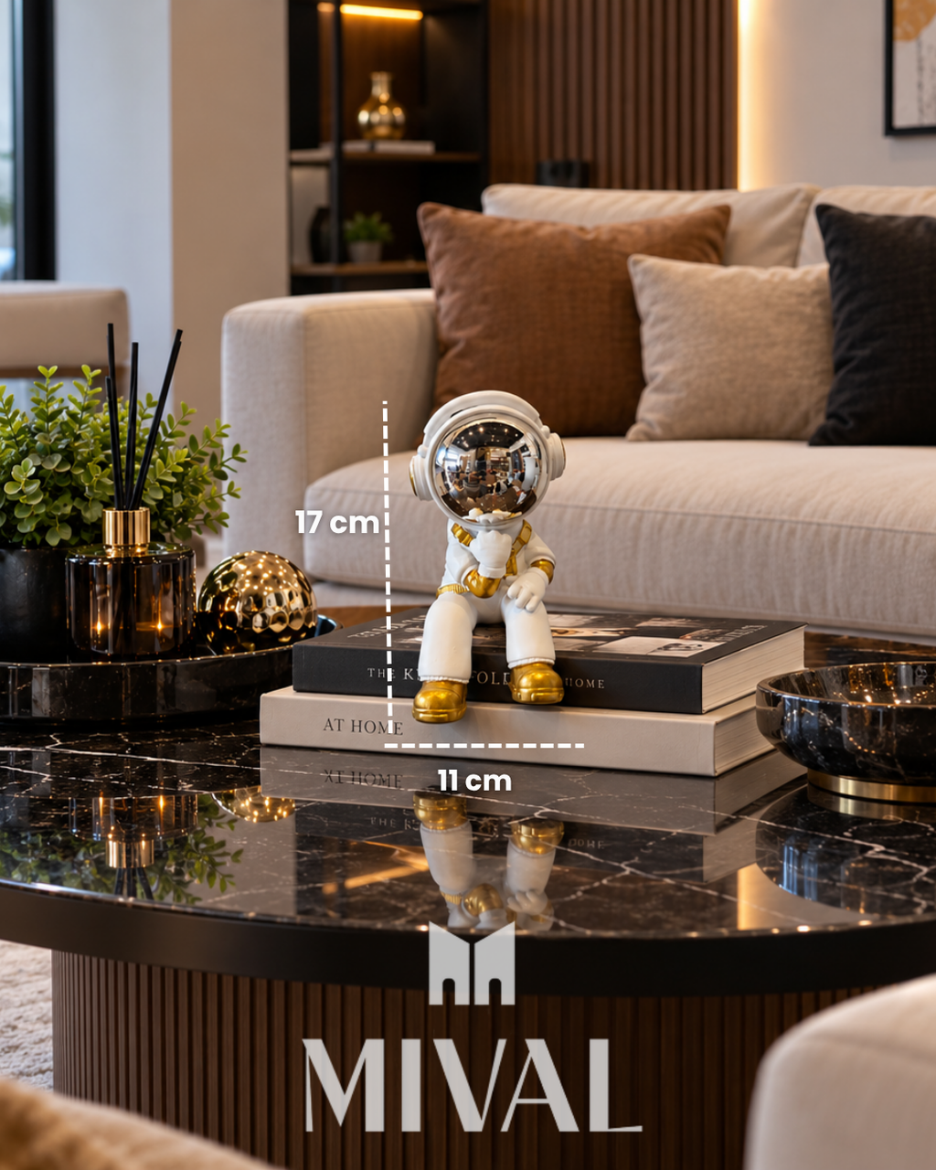 ASTRONAUTA SENTADO DORADO