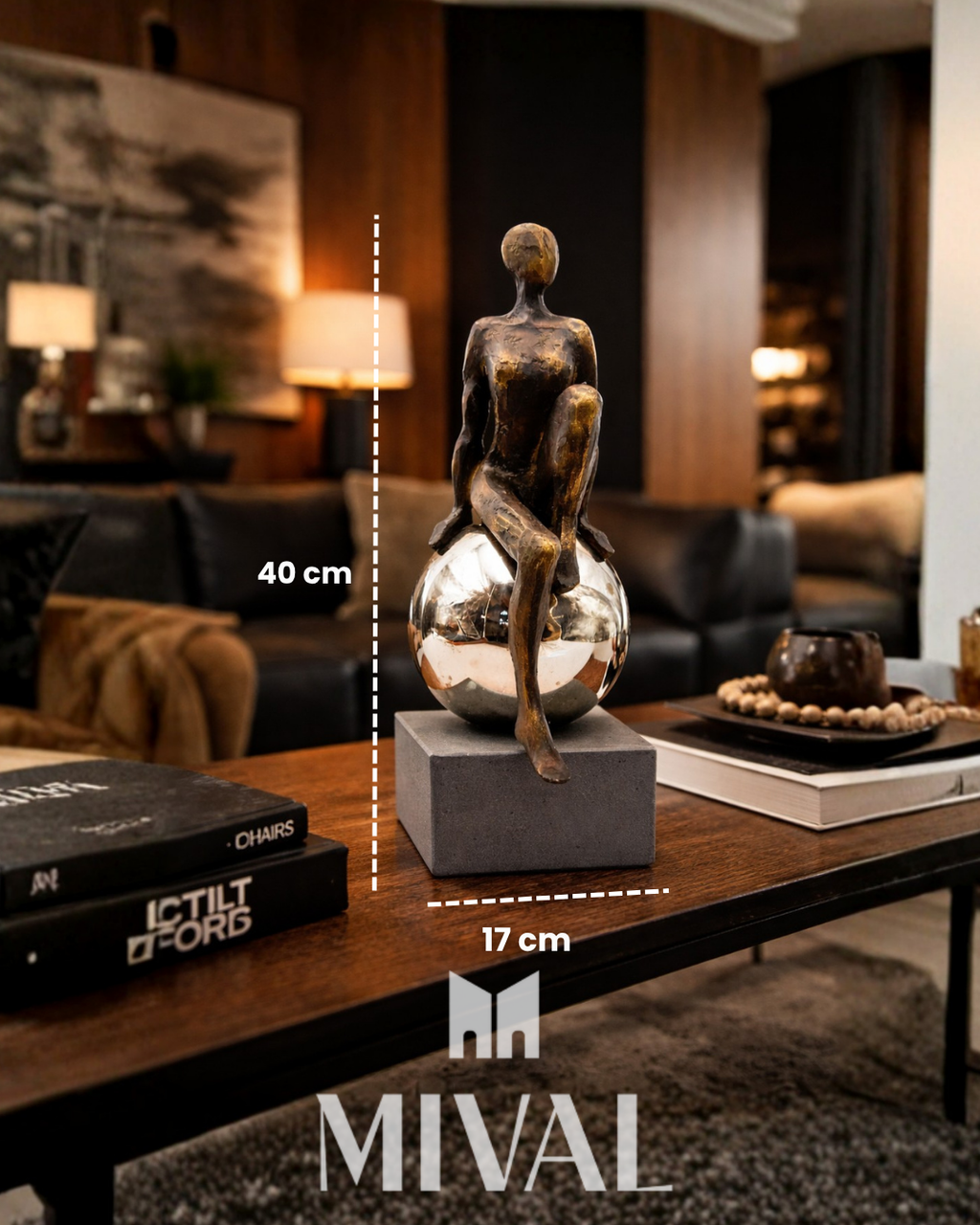 ESCULTURA MUJER SENTADA EN ESFERA