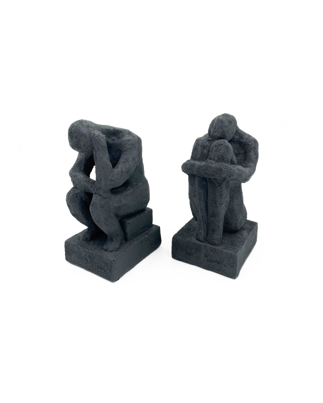 ESCULTURA PERSONAS AGACHADAS