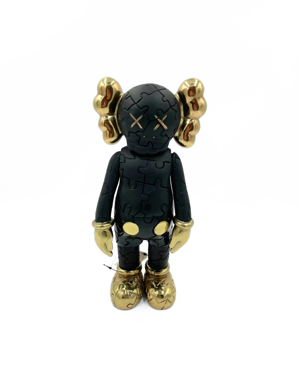 KAWS CHICO NEGRO CON DORADO